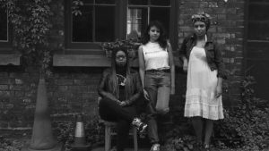 Three members of the band, Big Joanie.