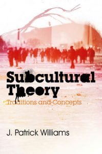 Book cover of Subcultural Theory Traditions and concepts.  A off-white peach colored background with undefined red-colored people gathered in the background.