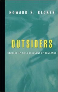 Blue cover with bolded title OUTSIDERS