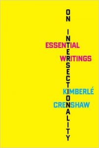 This is the front cover of Kimberle Crenshaw's Intersectionality: Essential Writings. The front cover is a plain yellow background, with text on the front that reads the title of the book and the author's name. The word, "intersectionality" is written vertically, with the words, "essential writings, kimberle crenshaw" intersecting horizontally with various letters in the word, "intersectionality". 