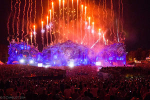 Tomorrowland Festival 2014 mainstage. Panoramic image of the stage lit up and fireworks shooting out from the top.