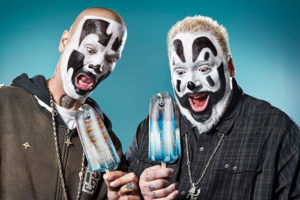The two main singers of Insane Clown Posse in their black and white clown makeup with surprised facial expressions. Shaggy 2 Dope (left) and Violent J (right).
