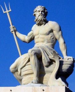Sculpture of Poseidon sitting on a rock/platform