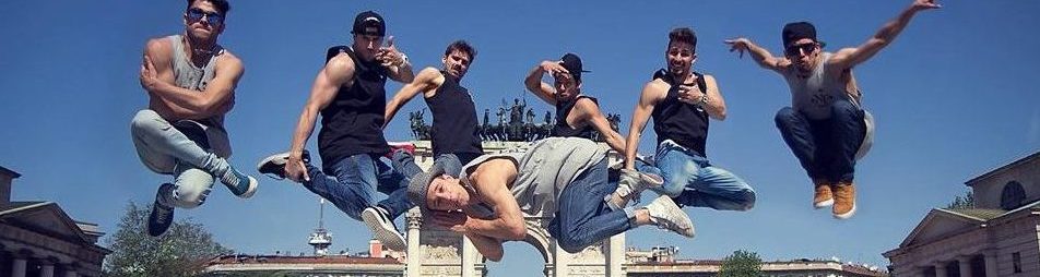 image of seven bboys jumping while dancing