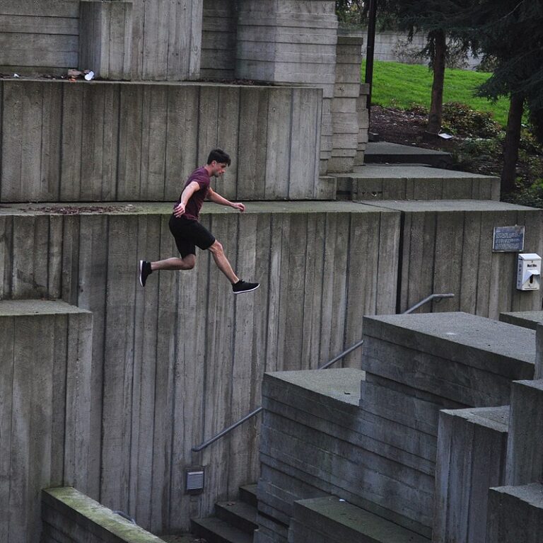 A man practices parkour   in Freeway Park, Seattle, Washington. Photo by WikiMedia Commons.